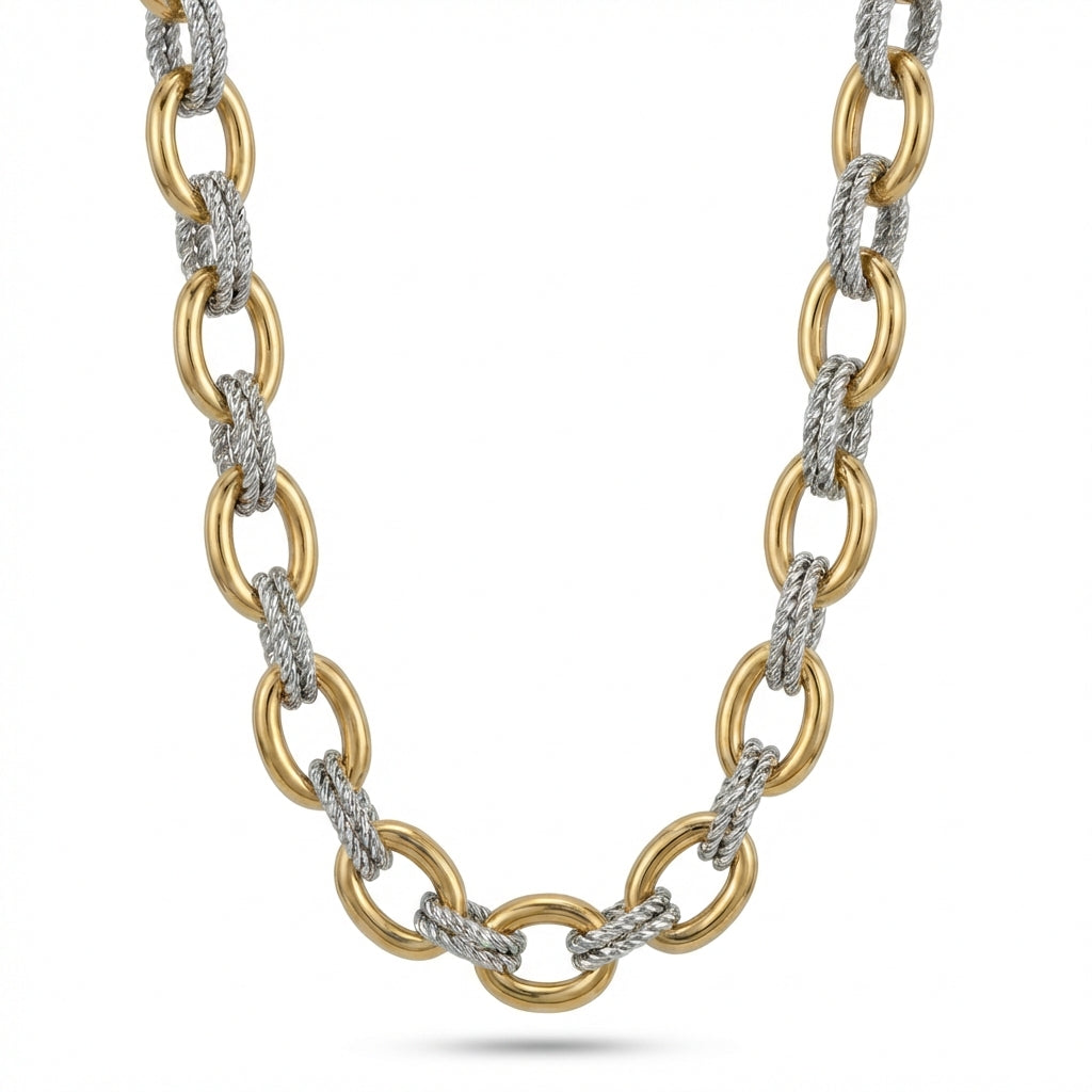 Gold and silver chain necklace on a white background
