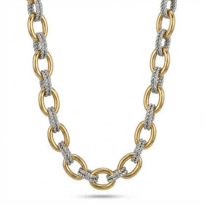 Gold and silver chain necklace on a white background